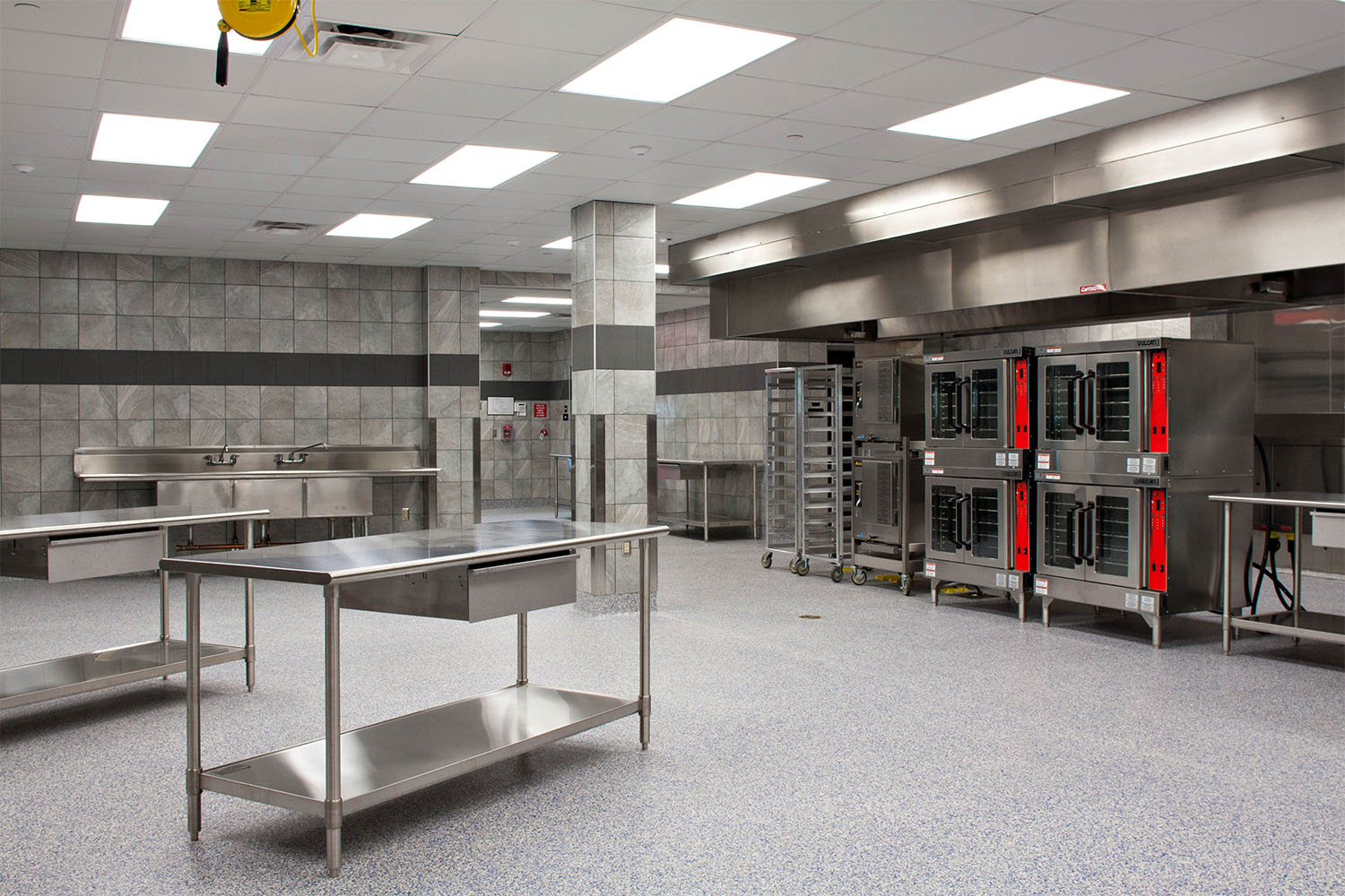 Kitchen and food prep area with stainless steel kitchen equipment