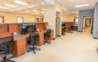 Administrative area of the Blackberry Center with desks, chairs, computers and file storage