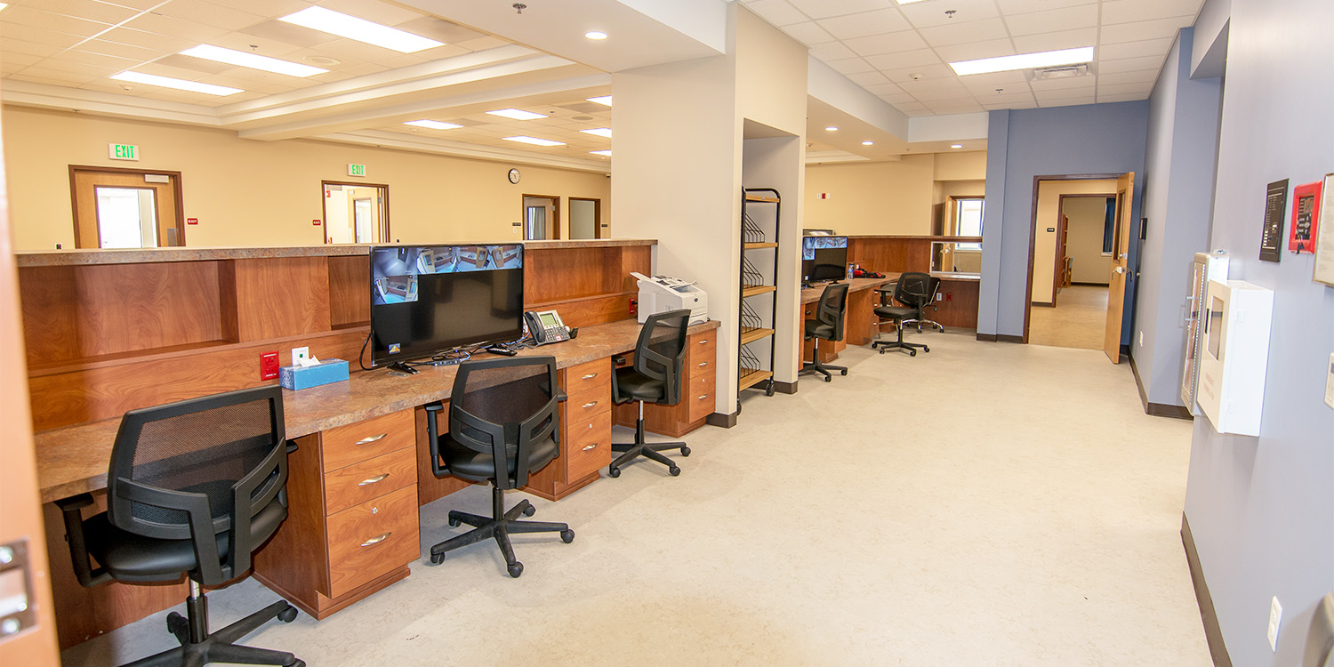 Administrative area of the Blackberry Center with desks, chairs, computers and file storage